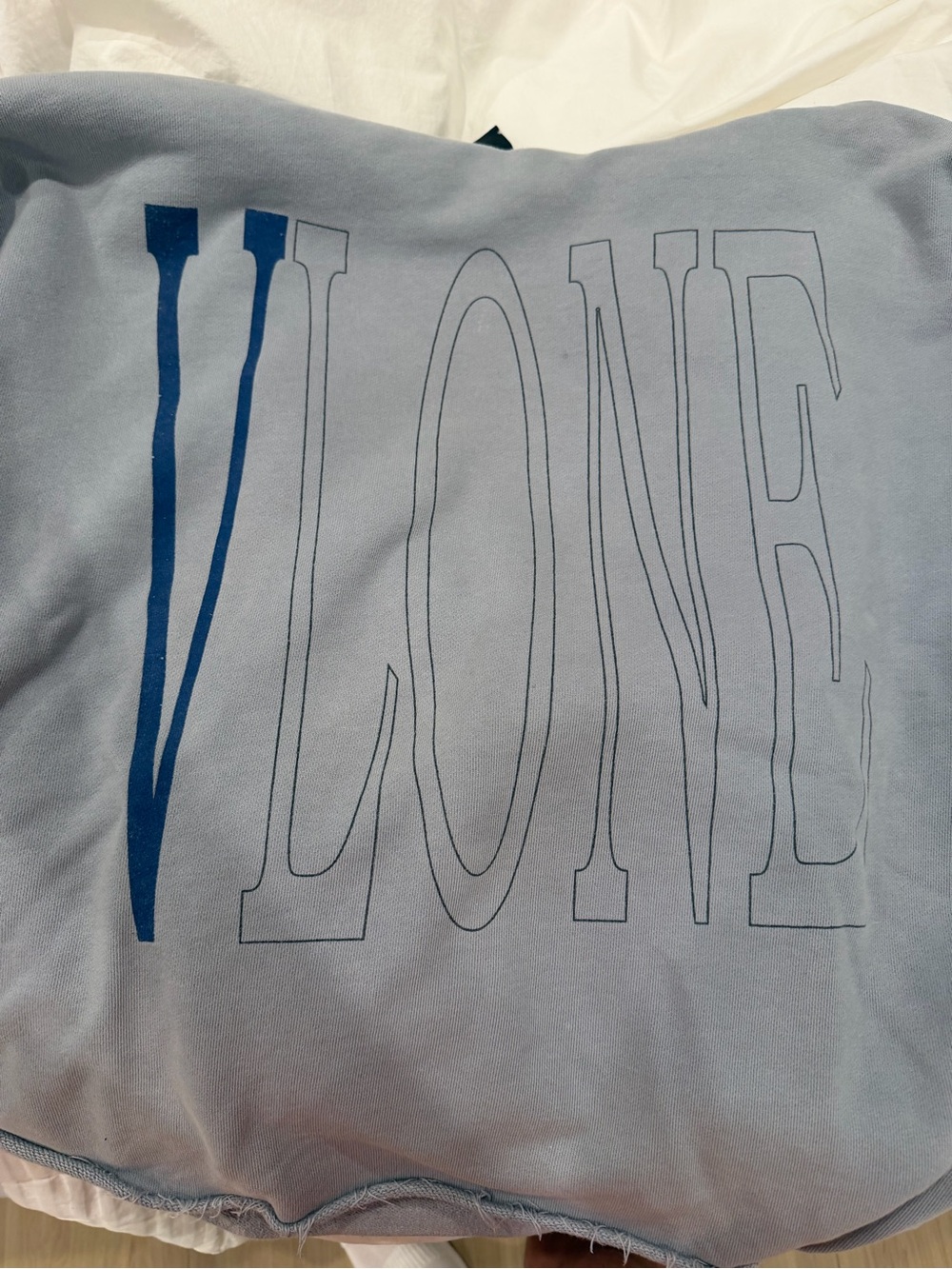 VLONE  Staple Light Blue Hoodie with Dark Blue 'V' Outline